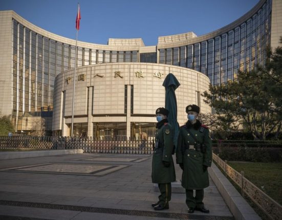 China's Central Bank Cuts Reserve Ratio to Boost Economy